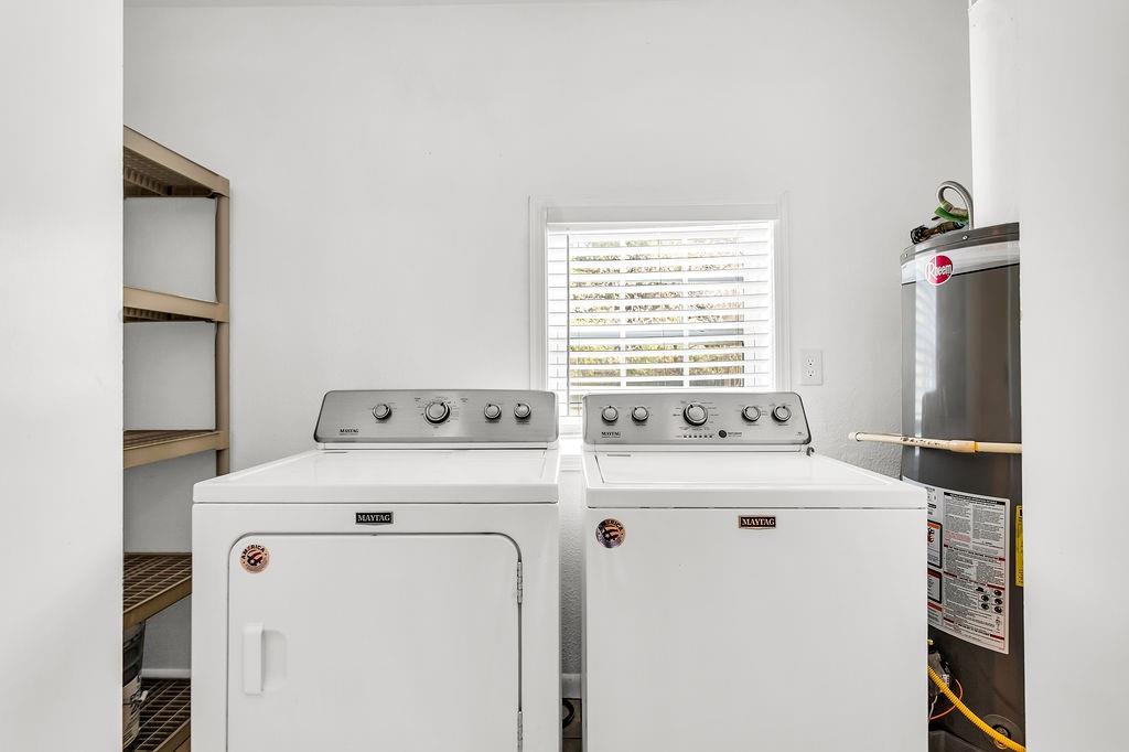 9440 Magnolia Road Frisco, TX 75033 - Photo 23 of 29 a utility room with dryer and washer