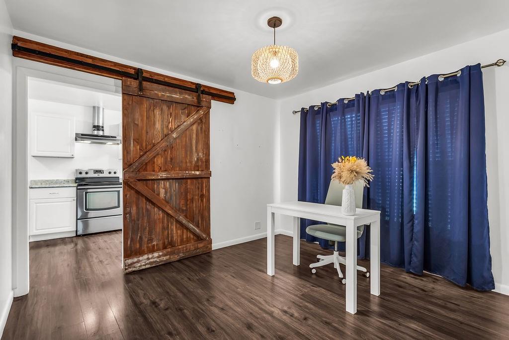 9440 Magnolia Road Frisco, TX 75033 - Photo 10 of 29 a view of kitchen with furniture and wooden floor
