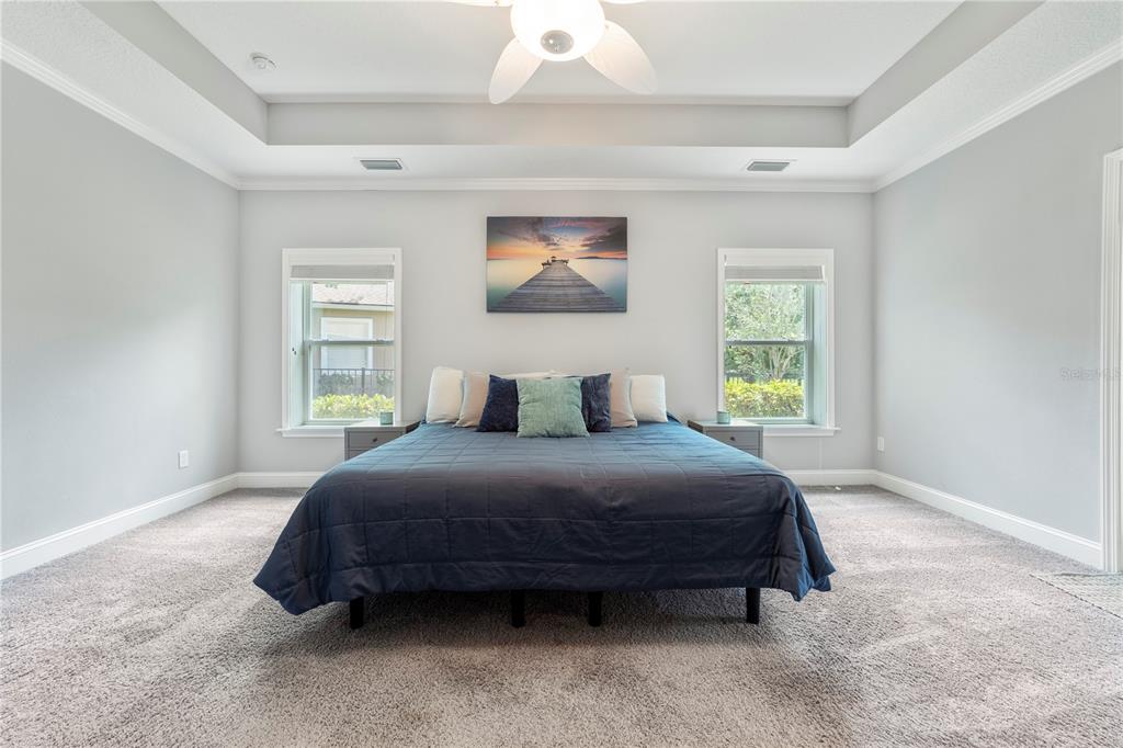 265 Pinehurst Pointe Drive St. Augustine, FL 32092 - Photo 34 of 66 a bedroom with a bed and a window