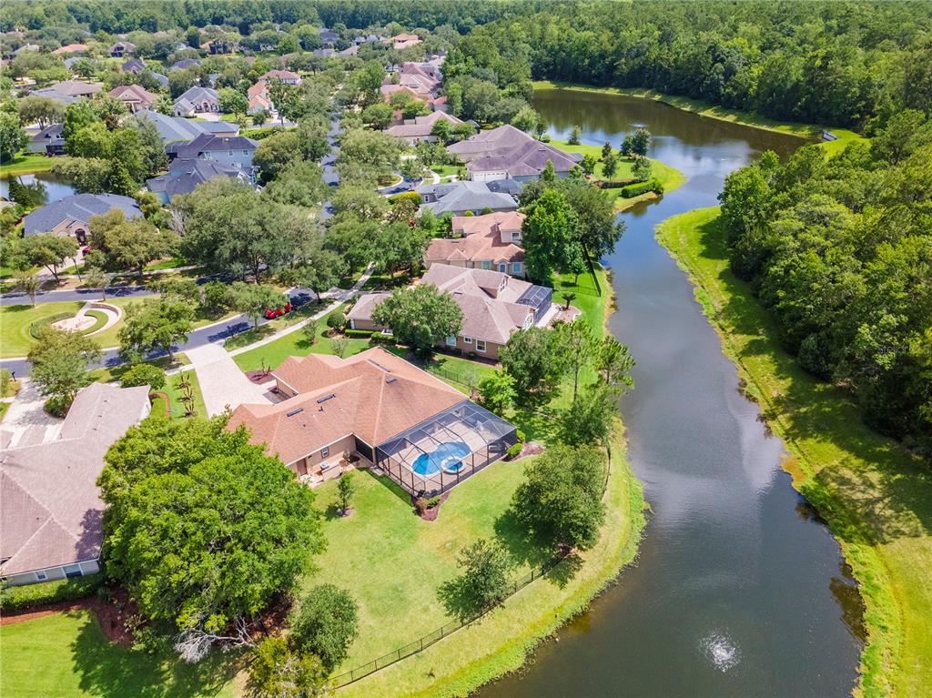 265 Pinehurst Pointe Drive St. Augustine, FL 32092 - Photo 52 of 66 an aerial view of a houses with outdoor space and lake view