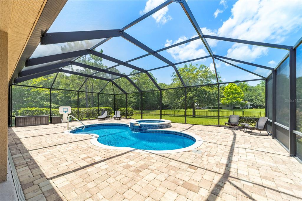 265 Pinehurst Pointe Drive St. Augustine, FL 32092 - Photo 59 of 66 a view of swimming pool with outdoor seating