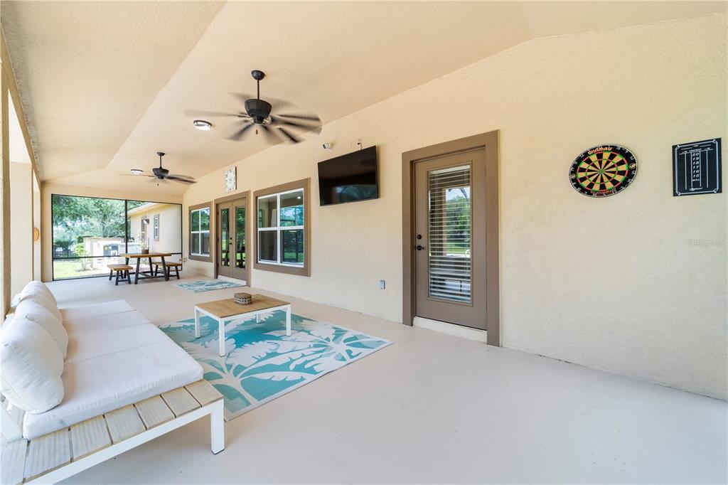 265 Pinehurst Pointe Drive St. Augustine, FL 32092 - Photo 6 of 66 a living room with furniture and a window
