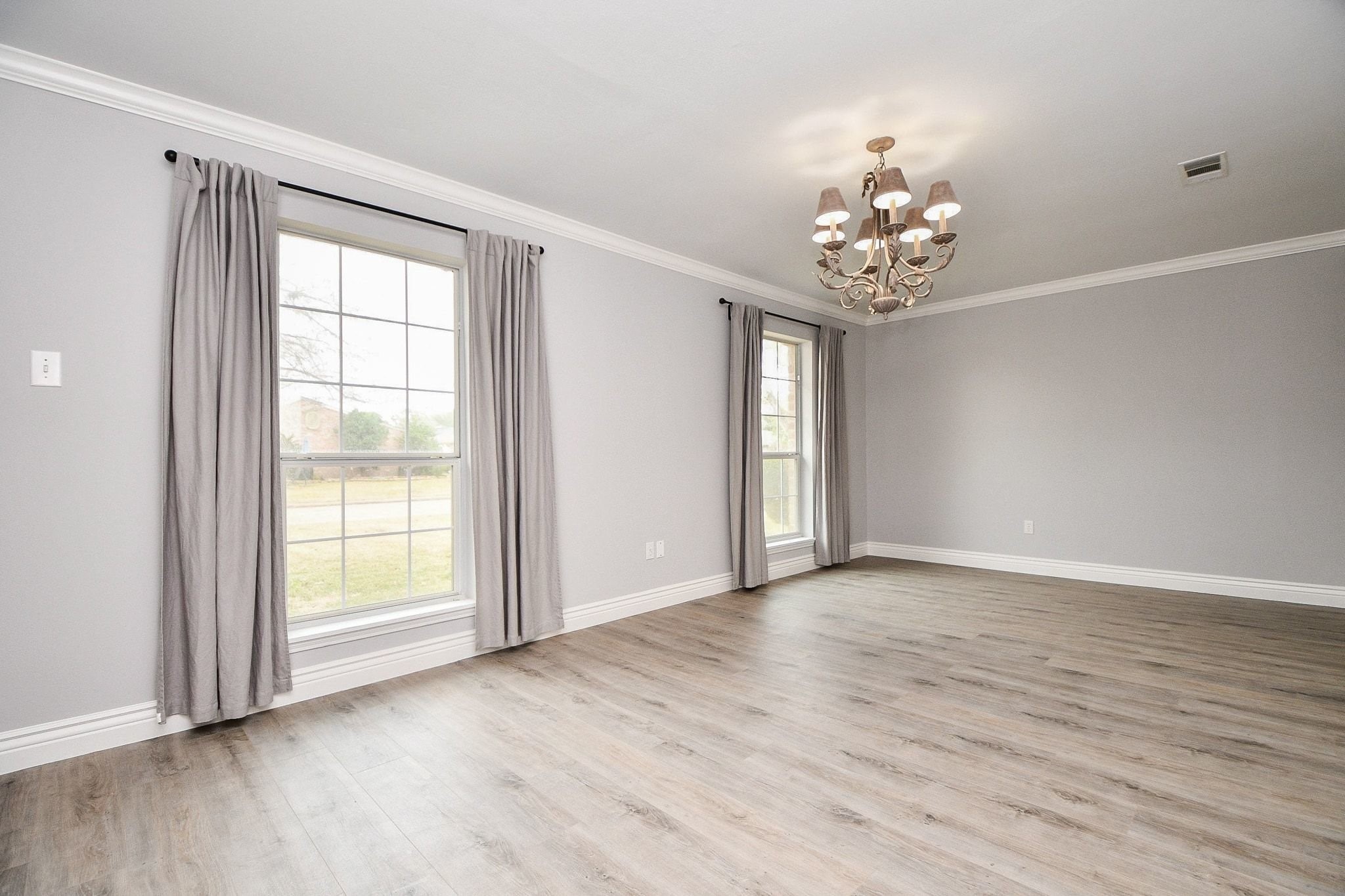 14011 Wickersham Lane Houston, TX 77077 - Photo 6 of 38 Spacious formal dining just off foyer and overlooking front yard.