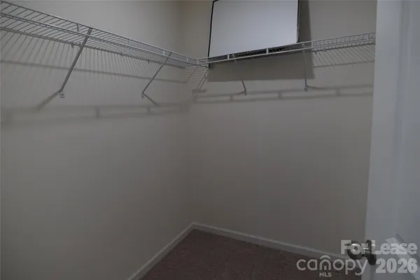a view of a room with racks on the wall
