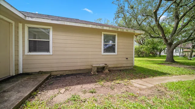 a view of a backyard with a garden
