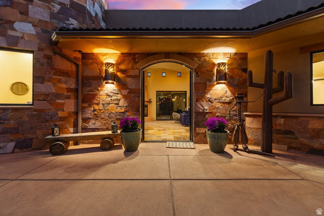 98 Bridge Road Rockville, UT 84763 - Photo 5 of 75 Property entrance with stone siding and a patio area