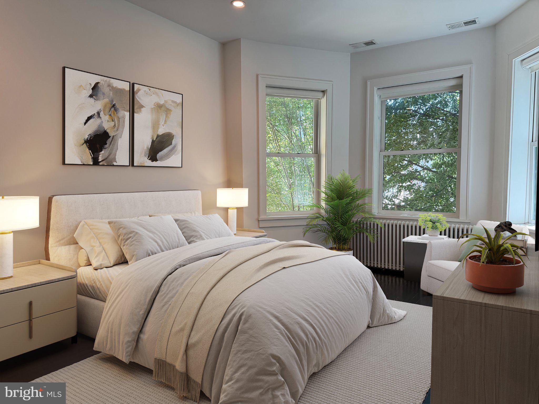 1009 Irving Street Northwest Washington, DC 20010 - Photo 21 of 33 Serene bedroom with natural light.