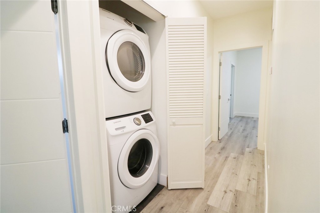 14254 Erwin Street Van Nuys, CA 91401 - Photo 12 of 18 a utility room with dryer and washer