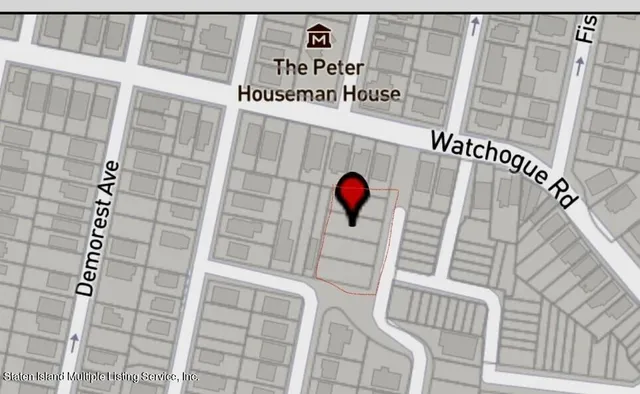 a view of a street with a building