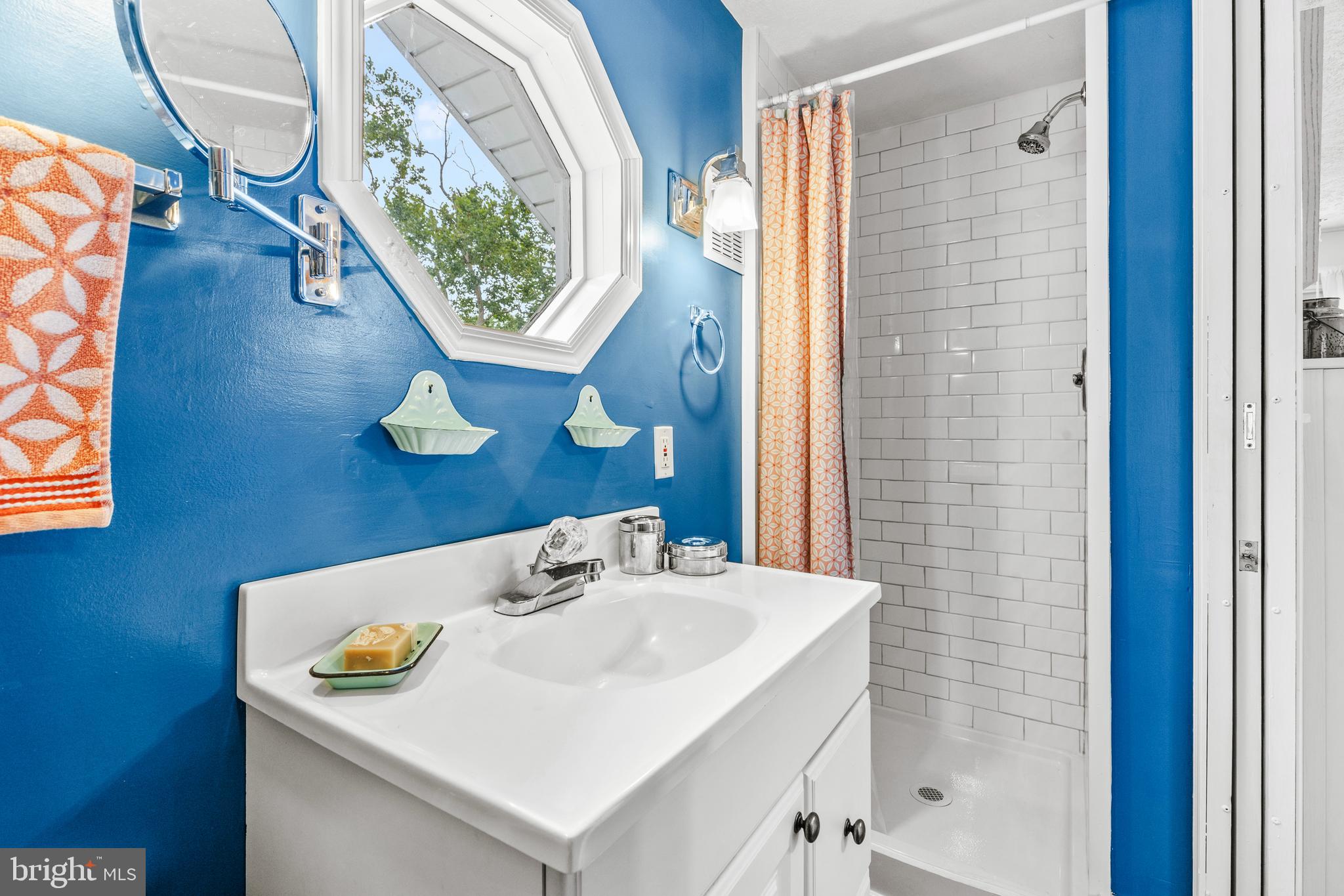 106 Orchard Road Riva, MD 21140 - Photo 26 of 38 a bathroom with a sink and a mirror