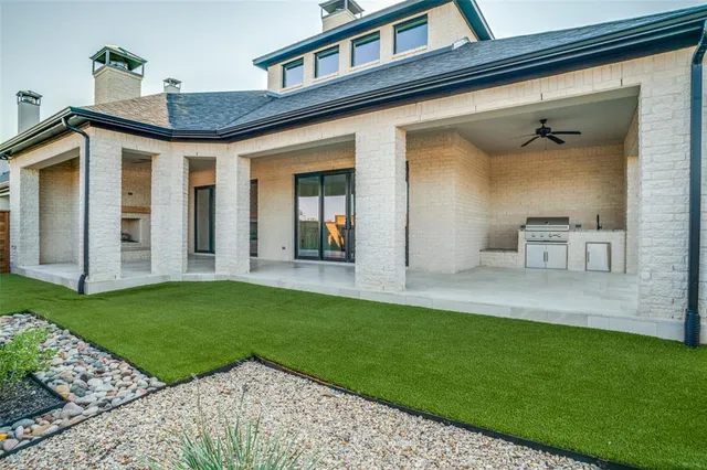 a view of a back yard from a patio