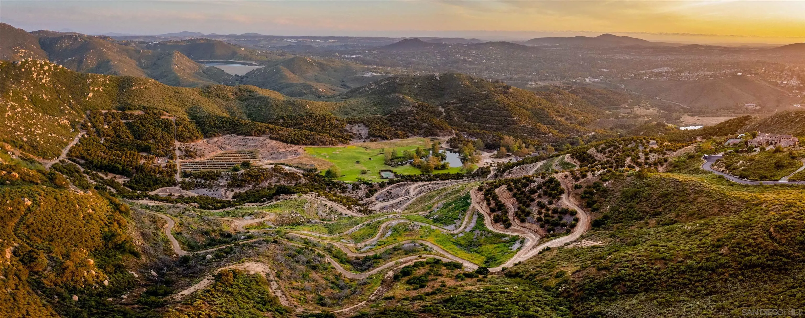 18035 Sunset Point, Unit 3 Poway, CA 92064 - Photo 14 of 62 a view of a lush green hillside and houses