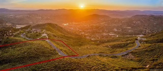 a view of a mountain from a yard