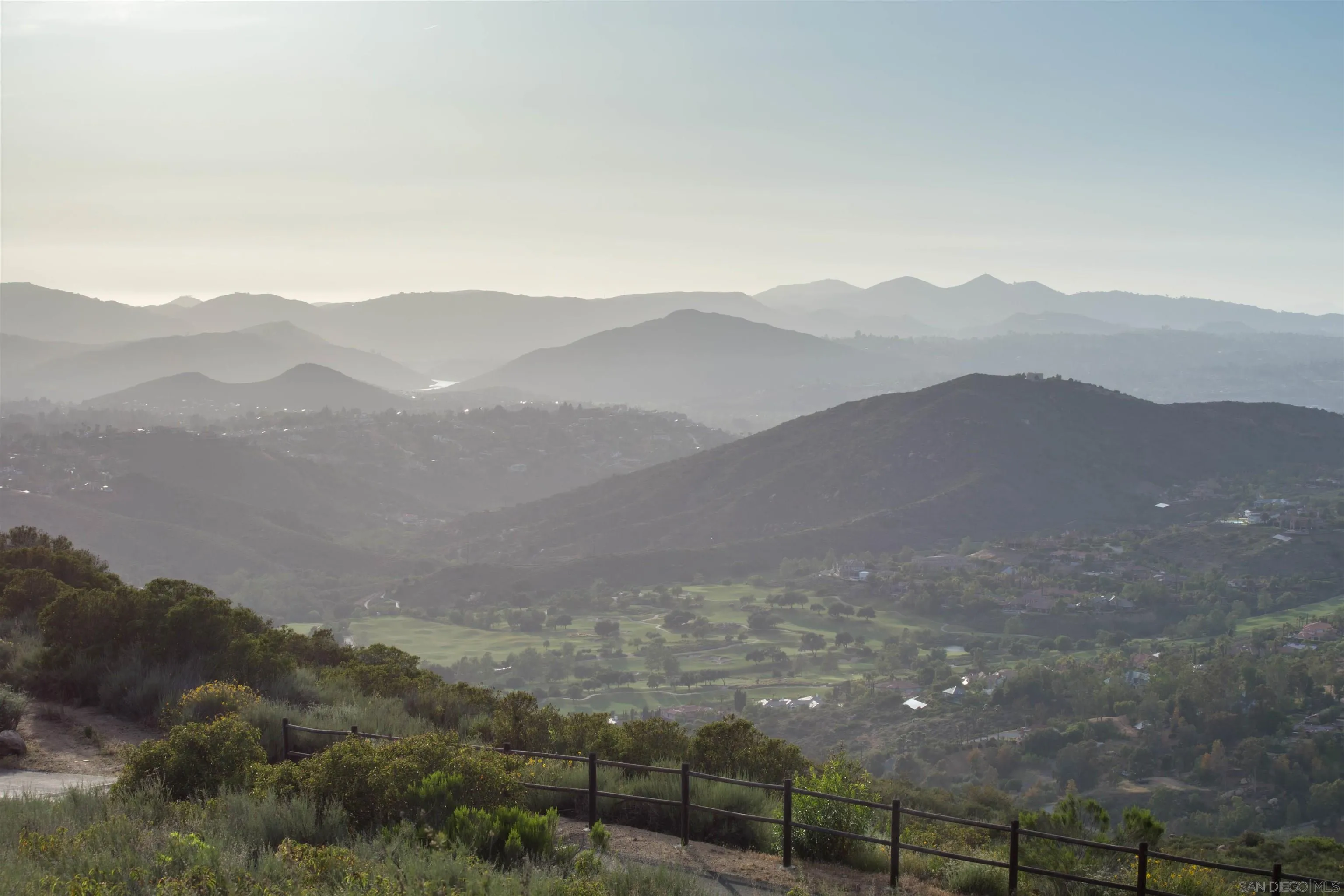 18035 Sunset Point, Unit 3 Poway, CA 92064 - Photo 29 of 61 a view of a town with mountains in the background