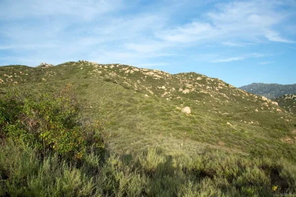 a view of mountain view with mountains in the background