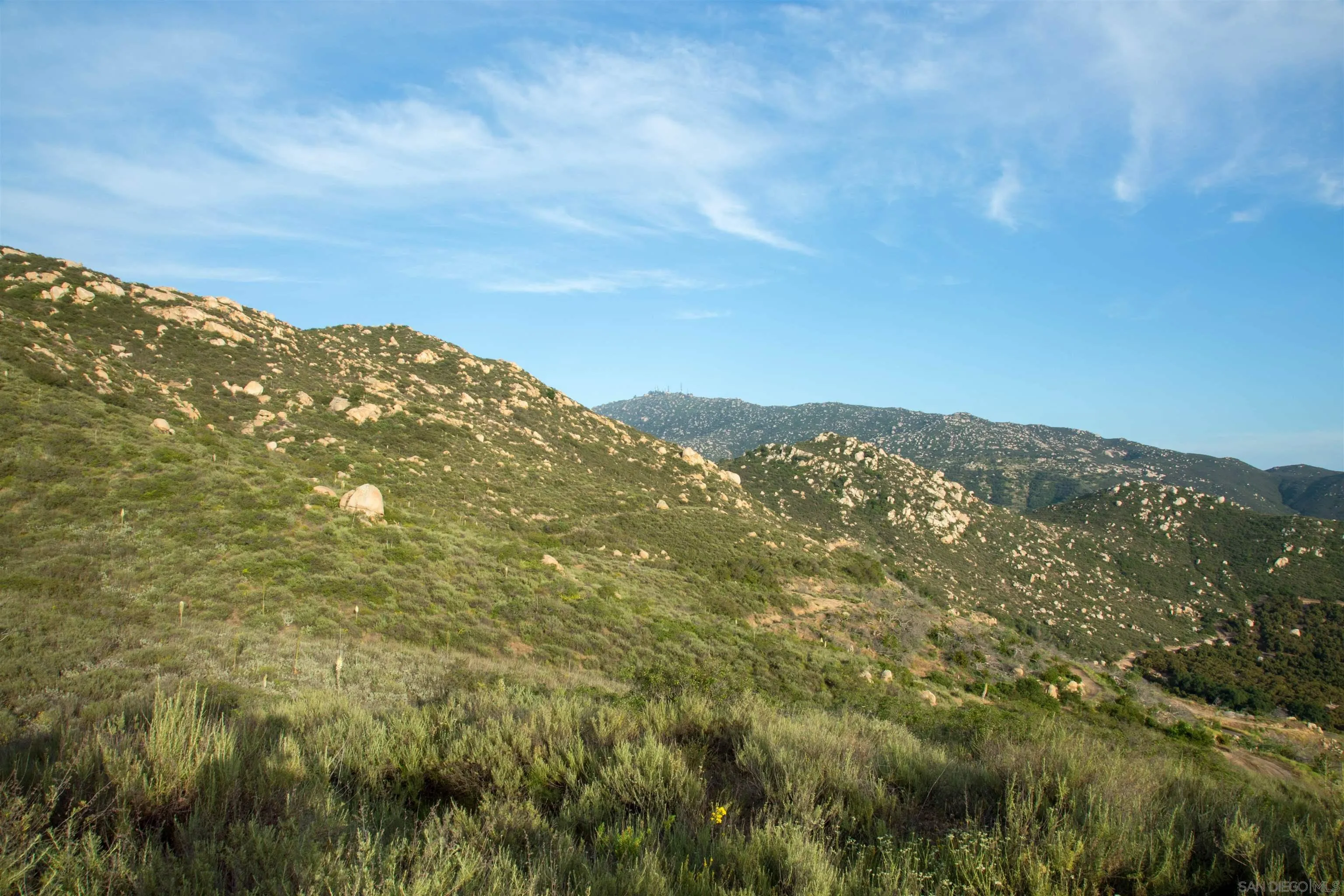 18035 Sunset Point, Unit 3 Poway, CA 92064 - Photo 33 of 62 a view of a large mountain with mountains in the background