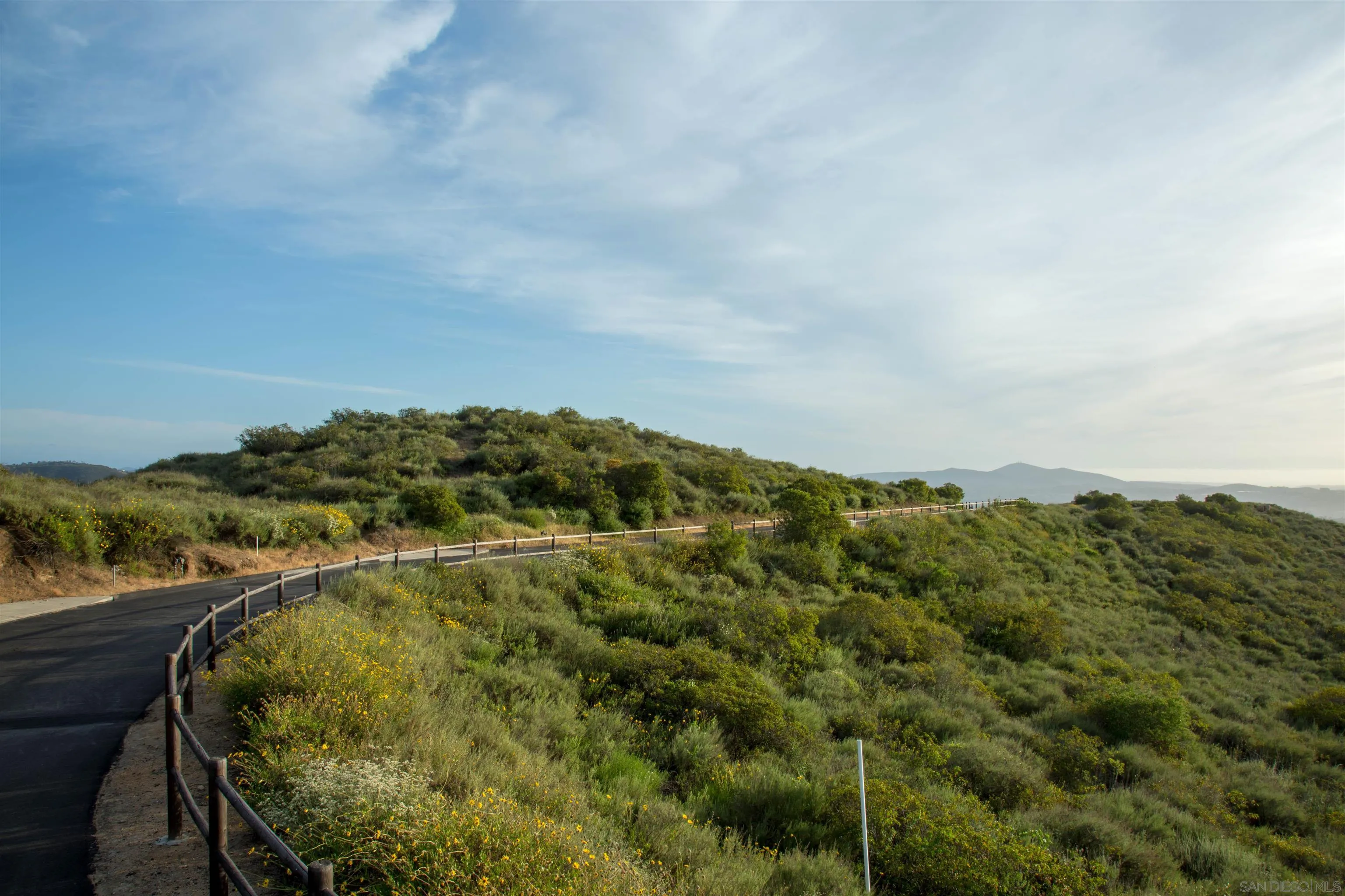 18035 Sunset Point, Unit 3 Poway, CA 92064 - Photo 39 of 61 a view of a houses with a forest