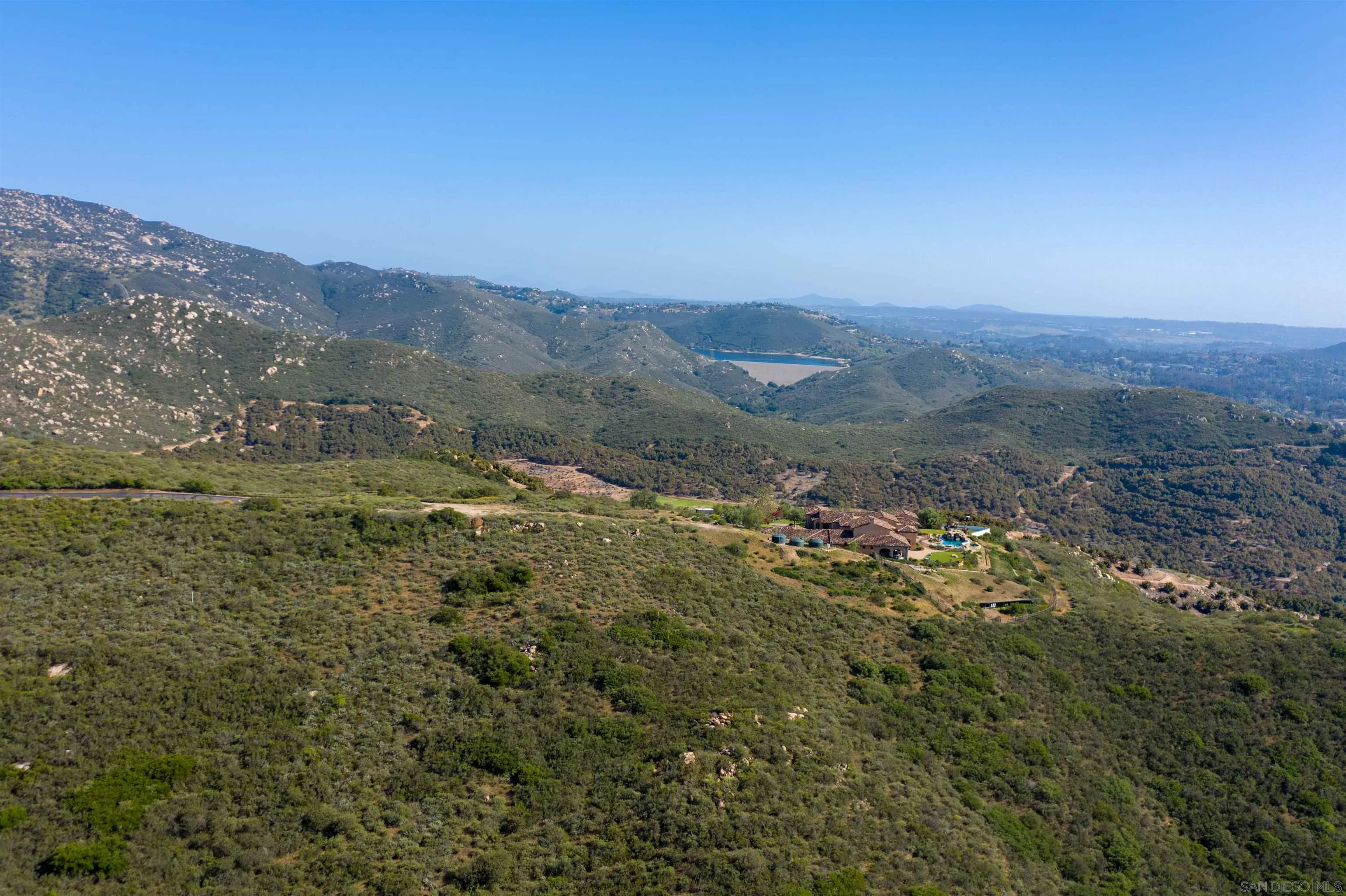18035 Sunset Point, Unit 3 Poway, CA 92064 - Photo 59 of 61 a view of a forest with mountains in the background