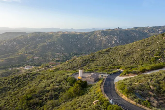 a view of a city with mountains in the background