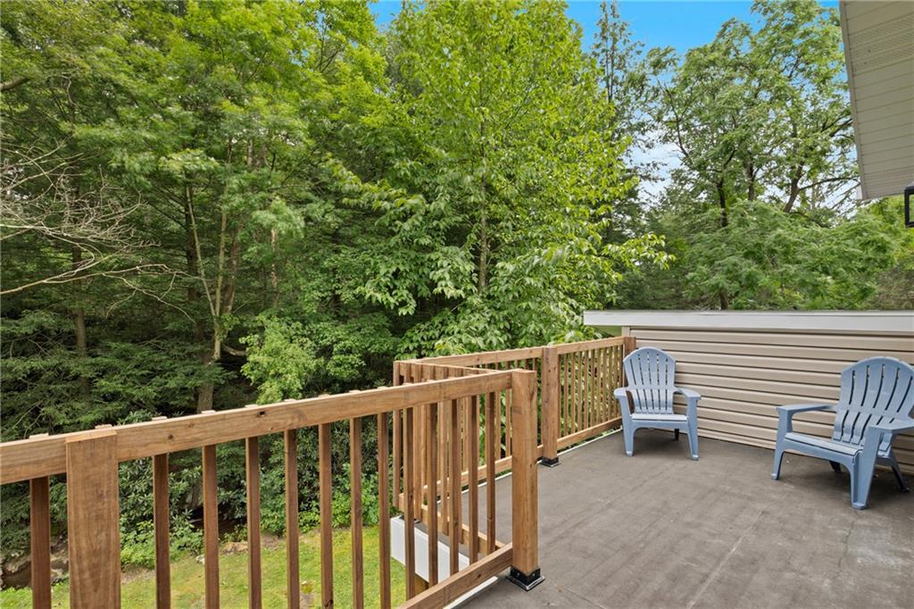480 Freeman Falls Road Acme, PA 15610 - Photo 22 of 45 a view of a two chairs in the roof deck