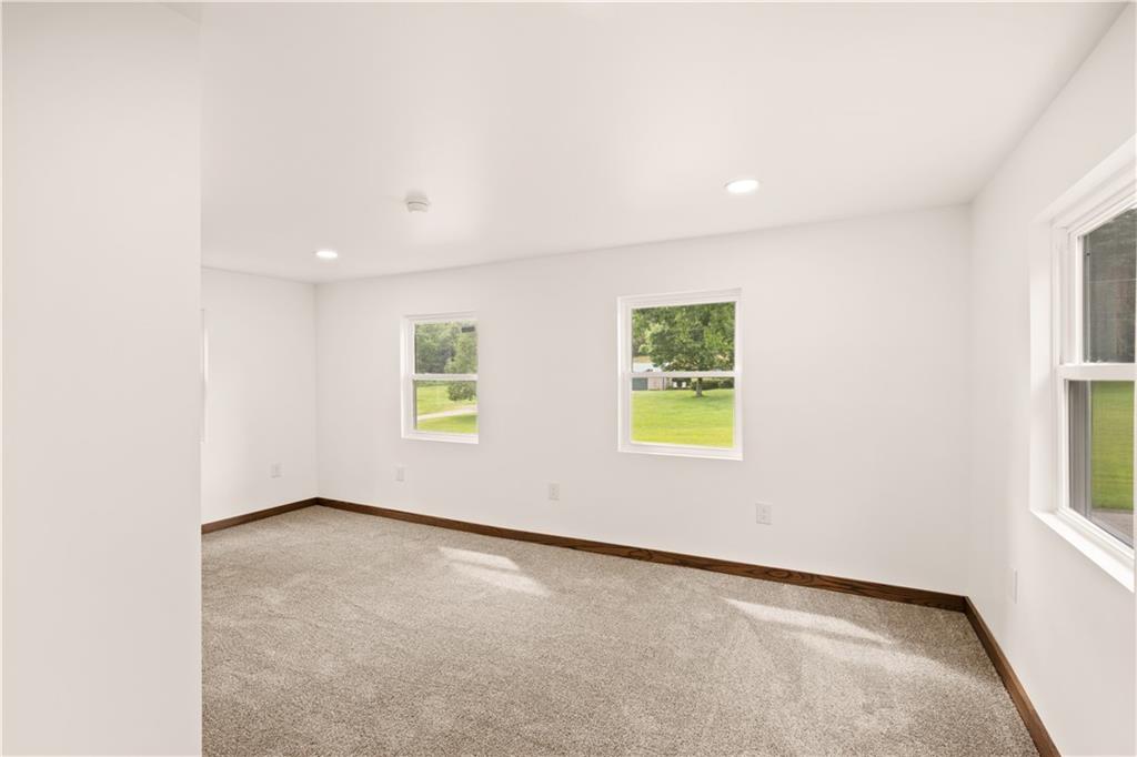 480 Freeman Falls Road Acme, PA 15610 - Photo 26 of 45 an empty room with windows