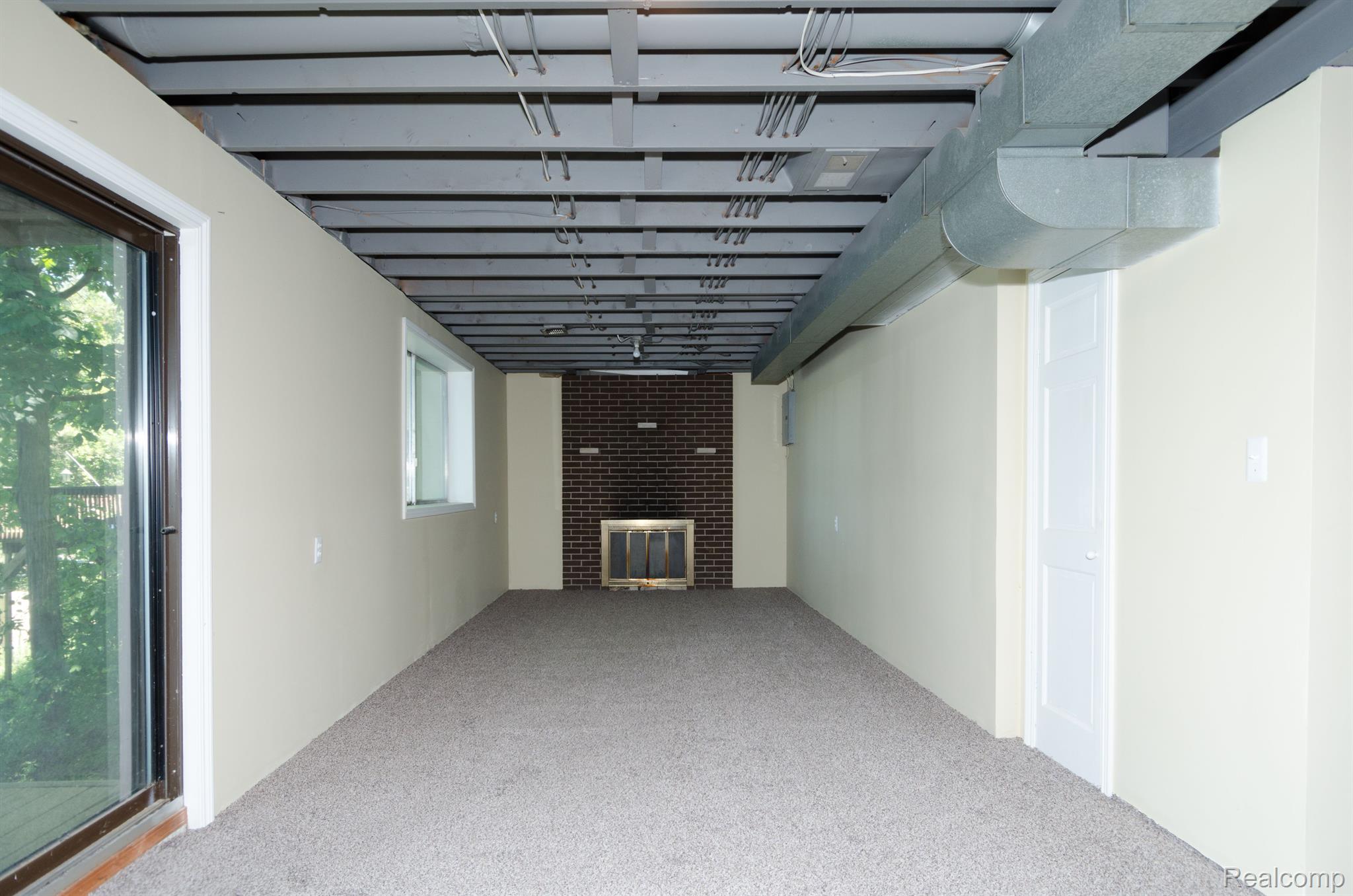 5335 Wayne Road White Lake, MI 48383 - Photo 25 of 29 5335 Wayne Rd - Family Room and Walkout to lake.