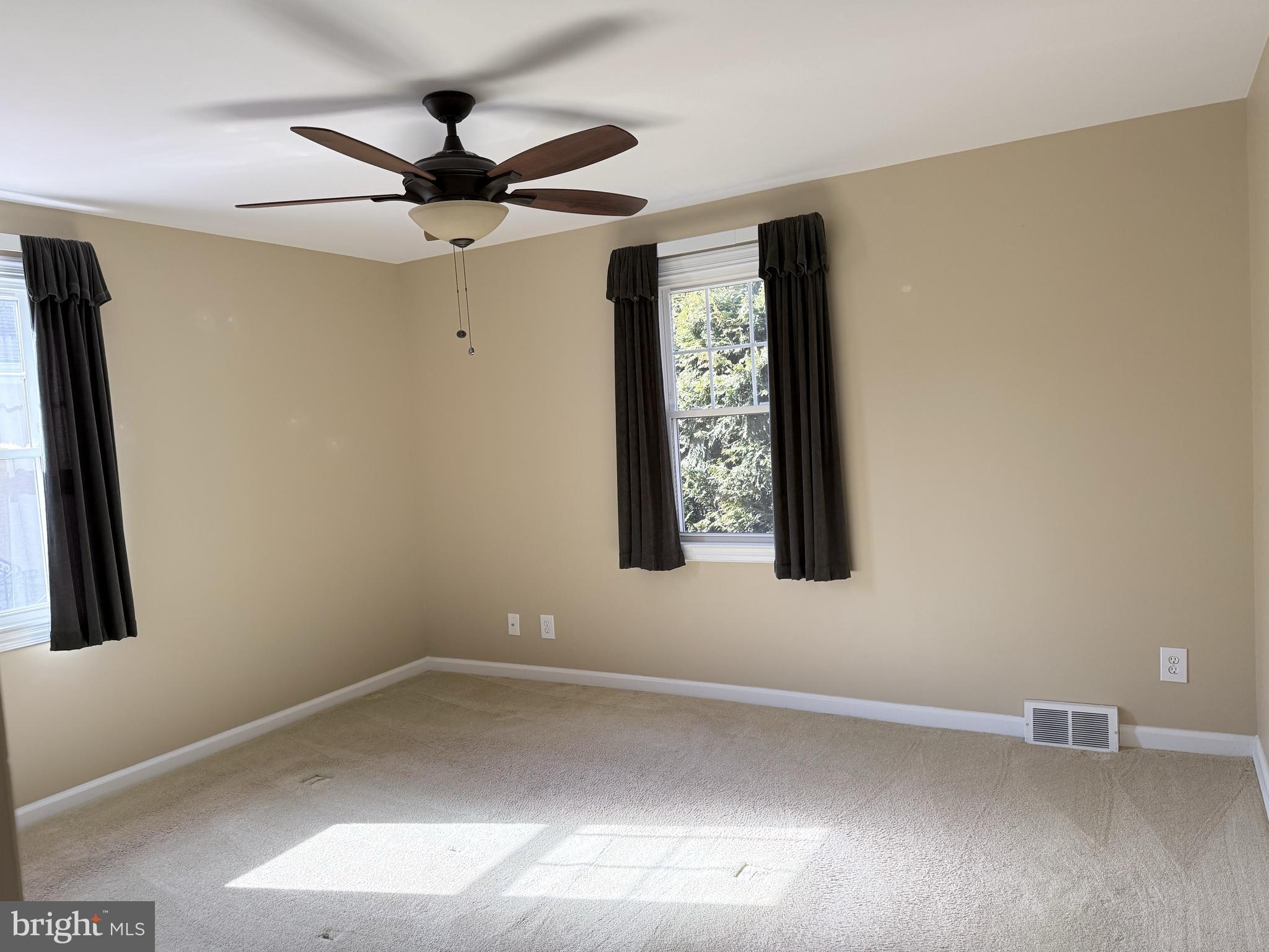 302 South Valley Forge Road Devon, PA 19333 - Photo 19 of 28 an empty room with windows and fan