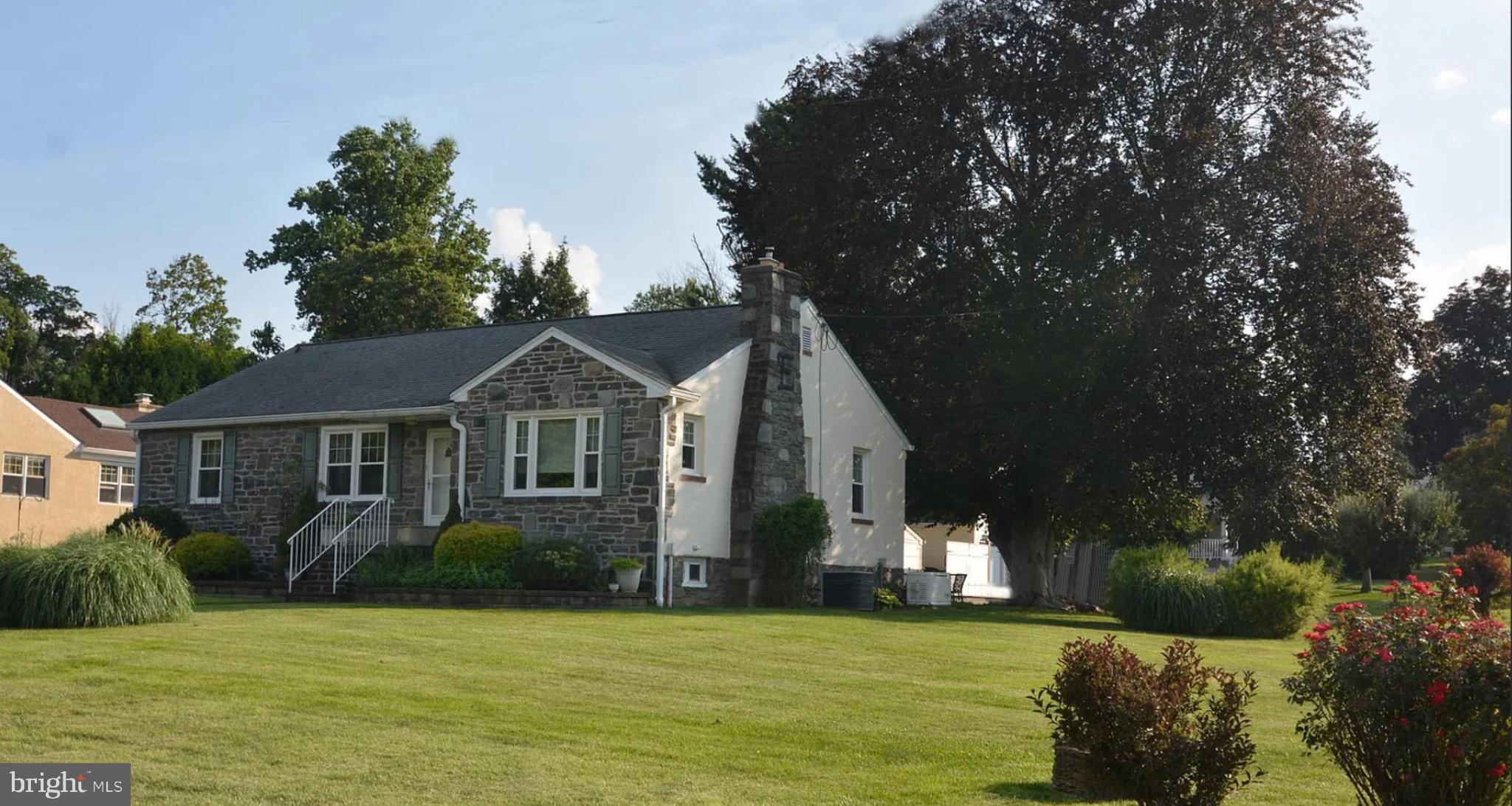 302 South Valley Forge Road Devon, PA 19333 - Photo 4 of 28 a view of a house with a big yard and potted plants