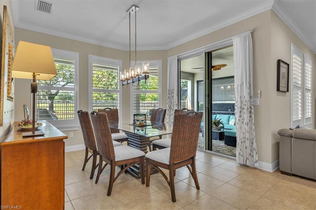16424 Windsor Way Alva, FL 33920 - Photo 14 of 48 a view of a dining room with furniture window and outside view