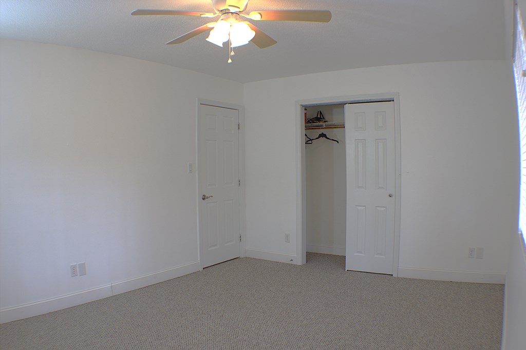 125 Moore View Drive Murphy, NC 28906 - Photo 12 of 49 an empty room with a chandelier fan
