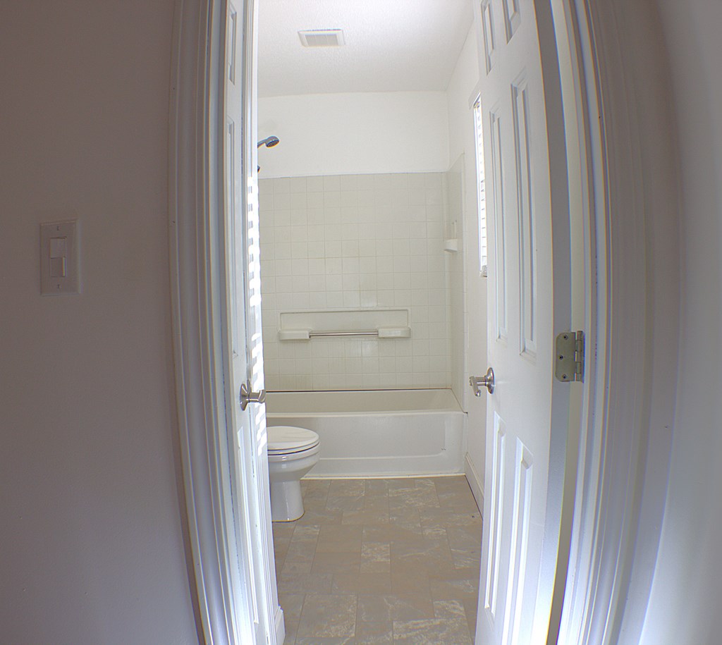 125 Moore View Drive Murphy, NC 28906 - Photo 24 of 49 a bathroom with a glass shower door