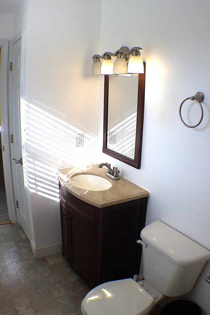 125 Moore View Drive Murphy, NC 28906 - Photo 25 of 49 a bathroom with a toilet sink and mirror