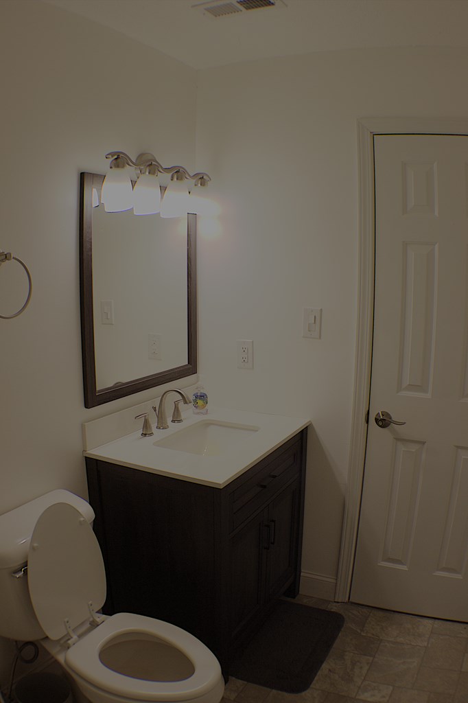 125 Moore View Drive Murphy, NC 28906 - Photo 28 of 49 a bathroom with a toilet sink and mirror