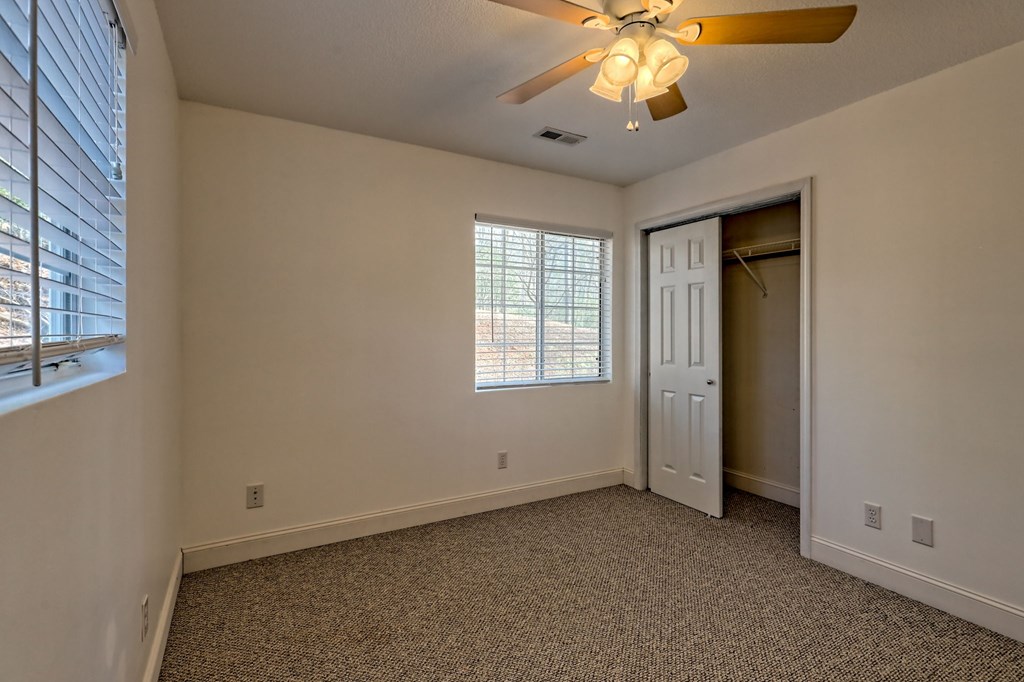 125 Moore View Drive Murphy, NC 28906 - Photo 39 of 49 an empty room with windows and fan