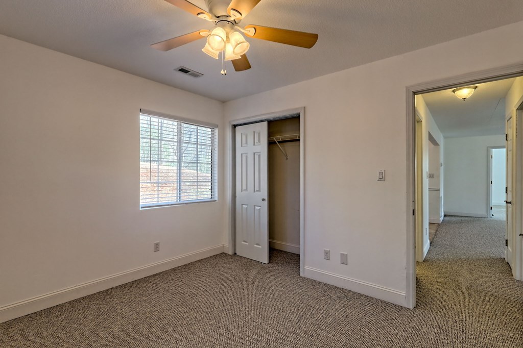 125 Moore View Drive Murphy, NC 28906 - Photo 40 of 49 an empty room with windows and fan