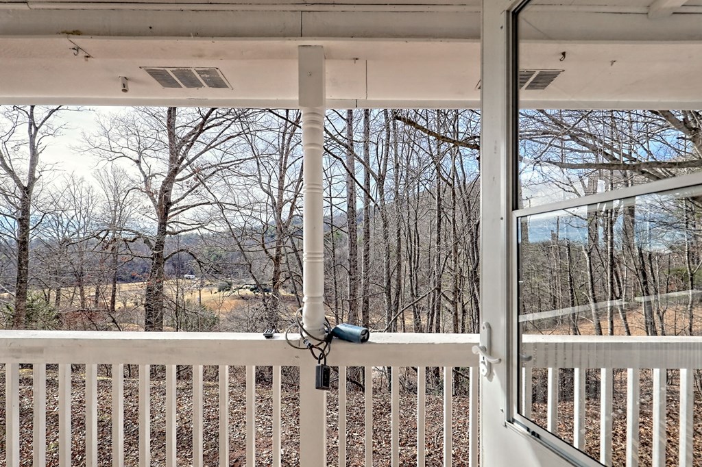 125 Moore View Drive Murphy, NC 28906 - Photo 48 of 49 a wooden fence with trees in the background