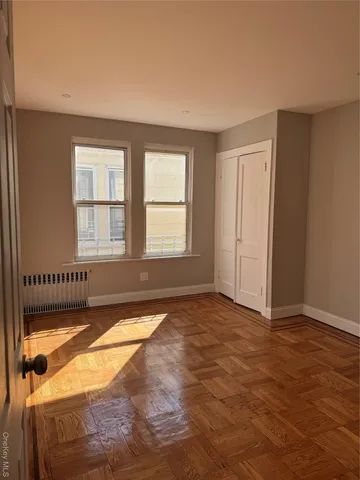 a view of an empty room and window