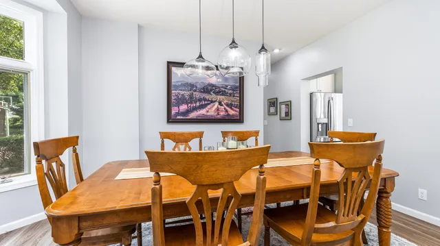 a bedroom with a bed and a lamp on table