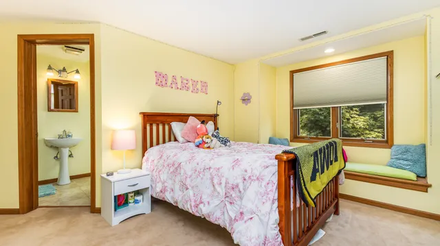 a view of a house with a yard porch and sitting area