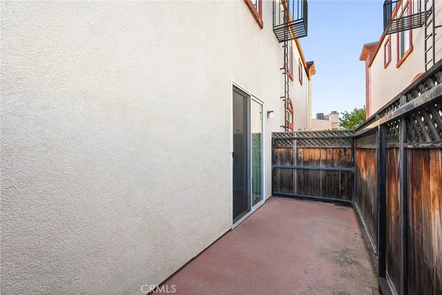 a view of a street with a building in the background