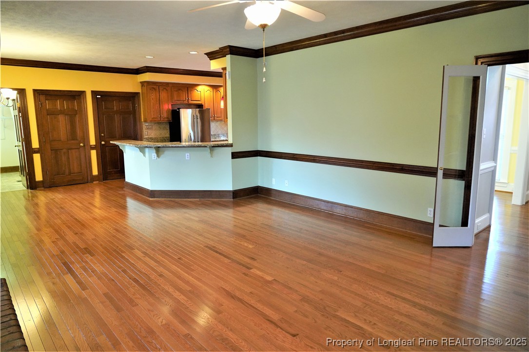 568 Broyhill Road Fayetteville, NC 28314 - Photo 13 of 37 a view of a room with wooden floor