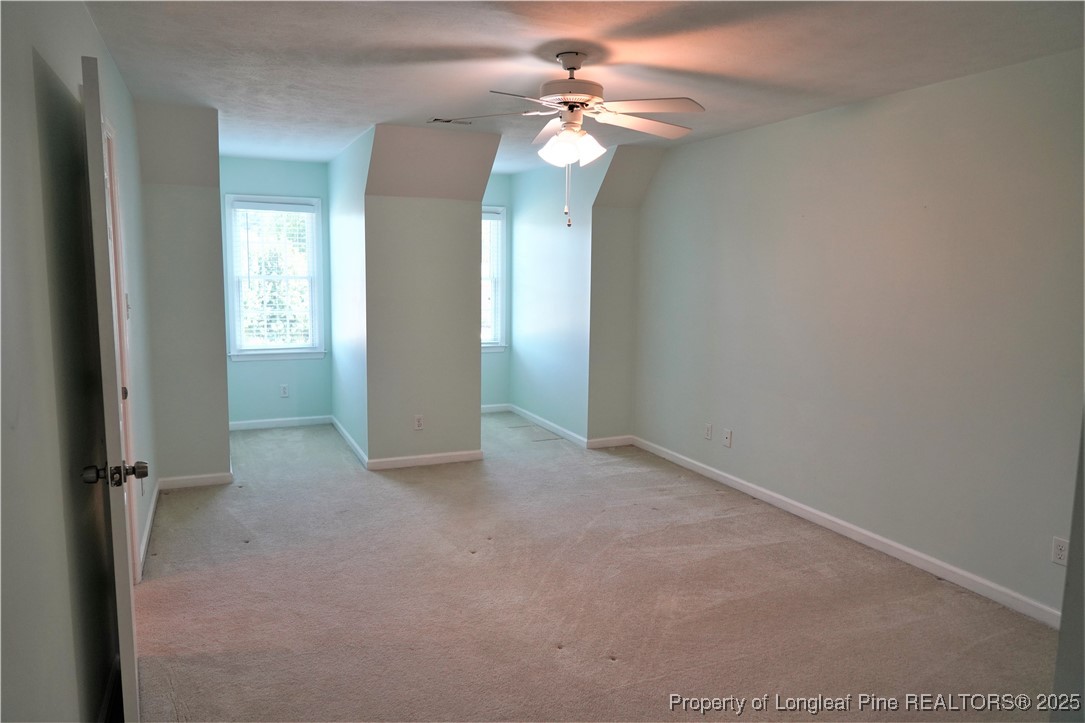 568 Broyhill Road Fayetteville, NC 28314 - Photo 26 of 37 an empty room with windows and fan