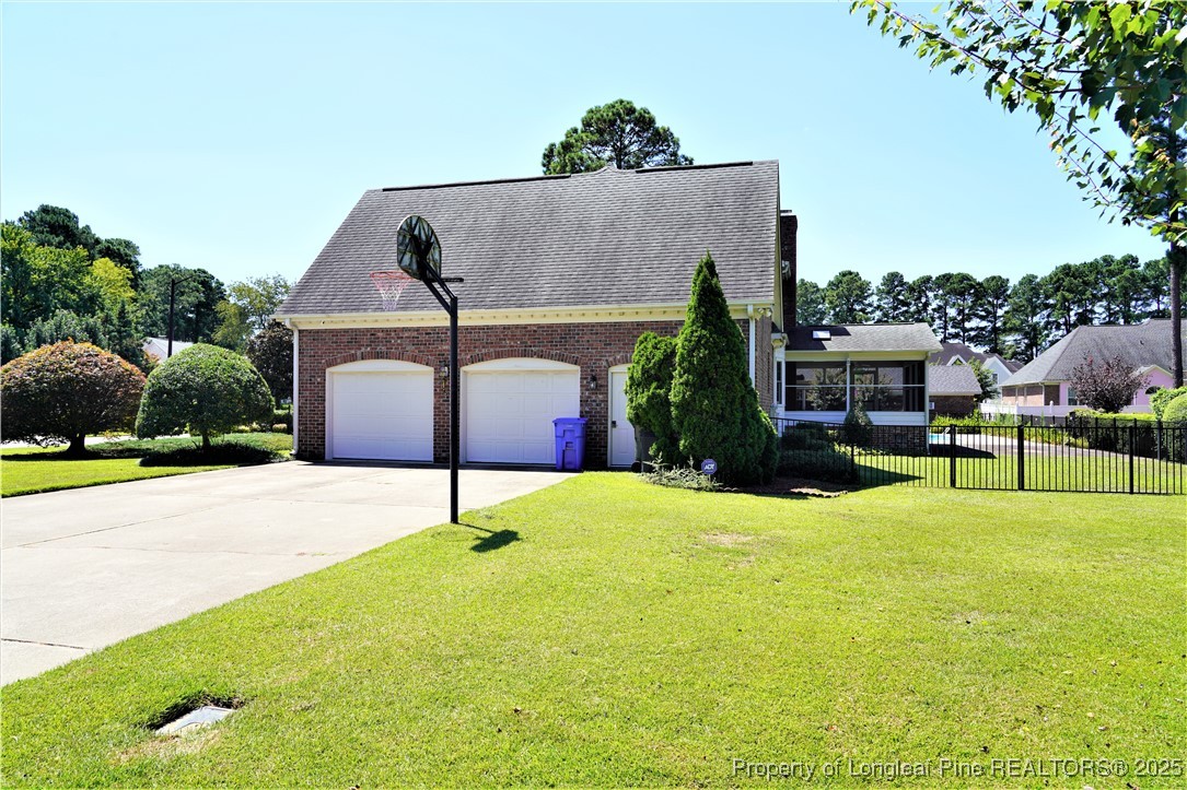 568 Broyhill Road Fayetteville, NC 28314 - Photo 32 of 37 a house view with a garden space
