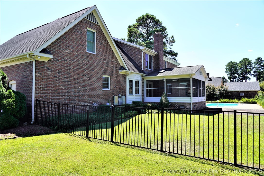 568 Broyhill Road Fayetteville, NC 28314 - Photo 33 of 37 a front view of a house with a garden
