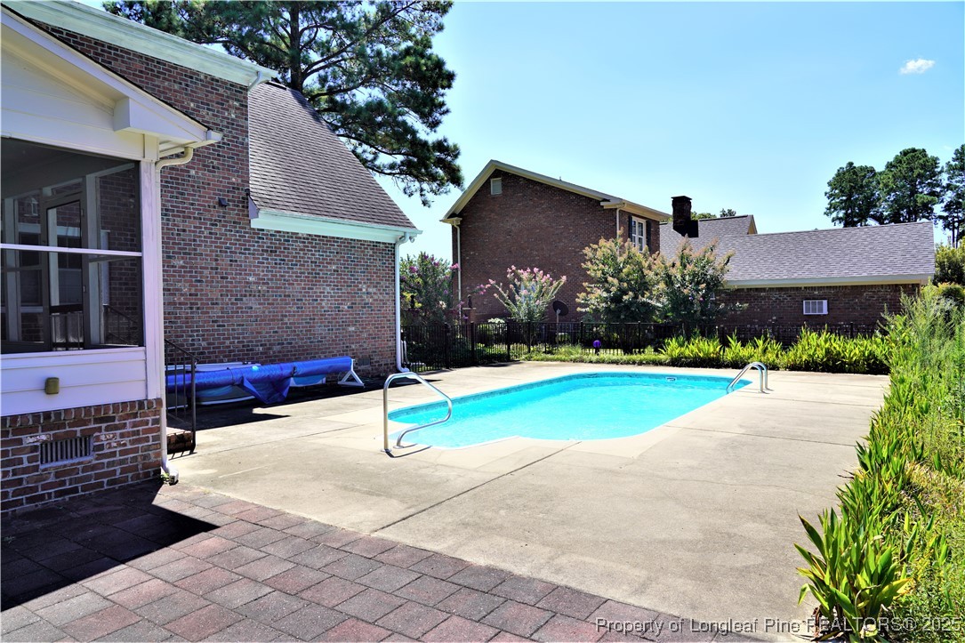 568 Broyhill Road Fayetteville, NC 28314 - Photo 34 of 37 a view of a house with backyard and tree s