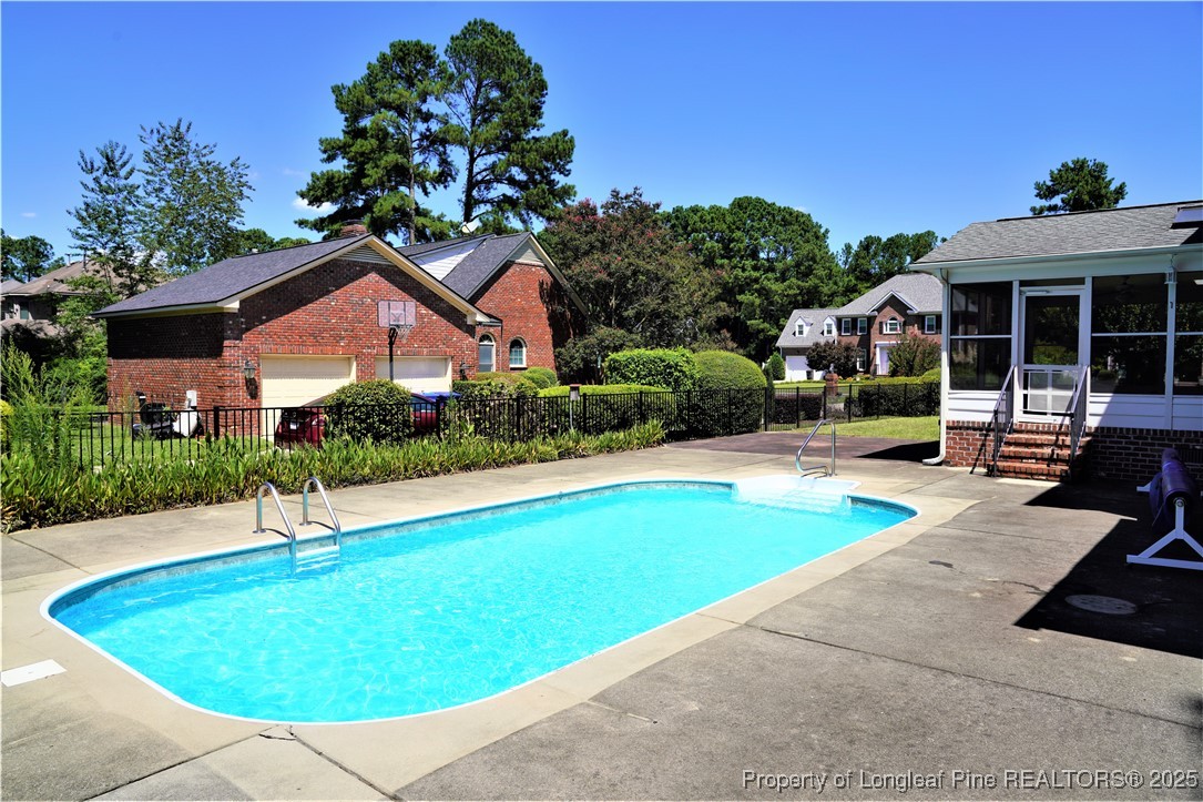568 Broyhill Road Fayetteville, NC 28314 - Photo 36 of 37 a house view with a swimming pool