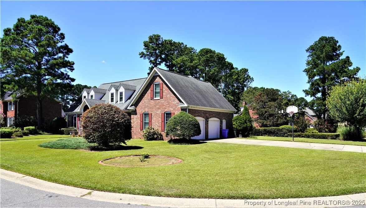 568 Broyhill Road Fayetteville, NC 28314 - Photo 5 of 37 a front view of a house with yard