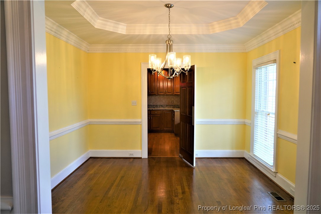 568 Broyhill Road Fayetteville, NC 28314 - Photo 7 of 37 a view of a room with wooden floor