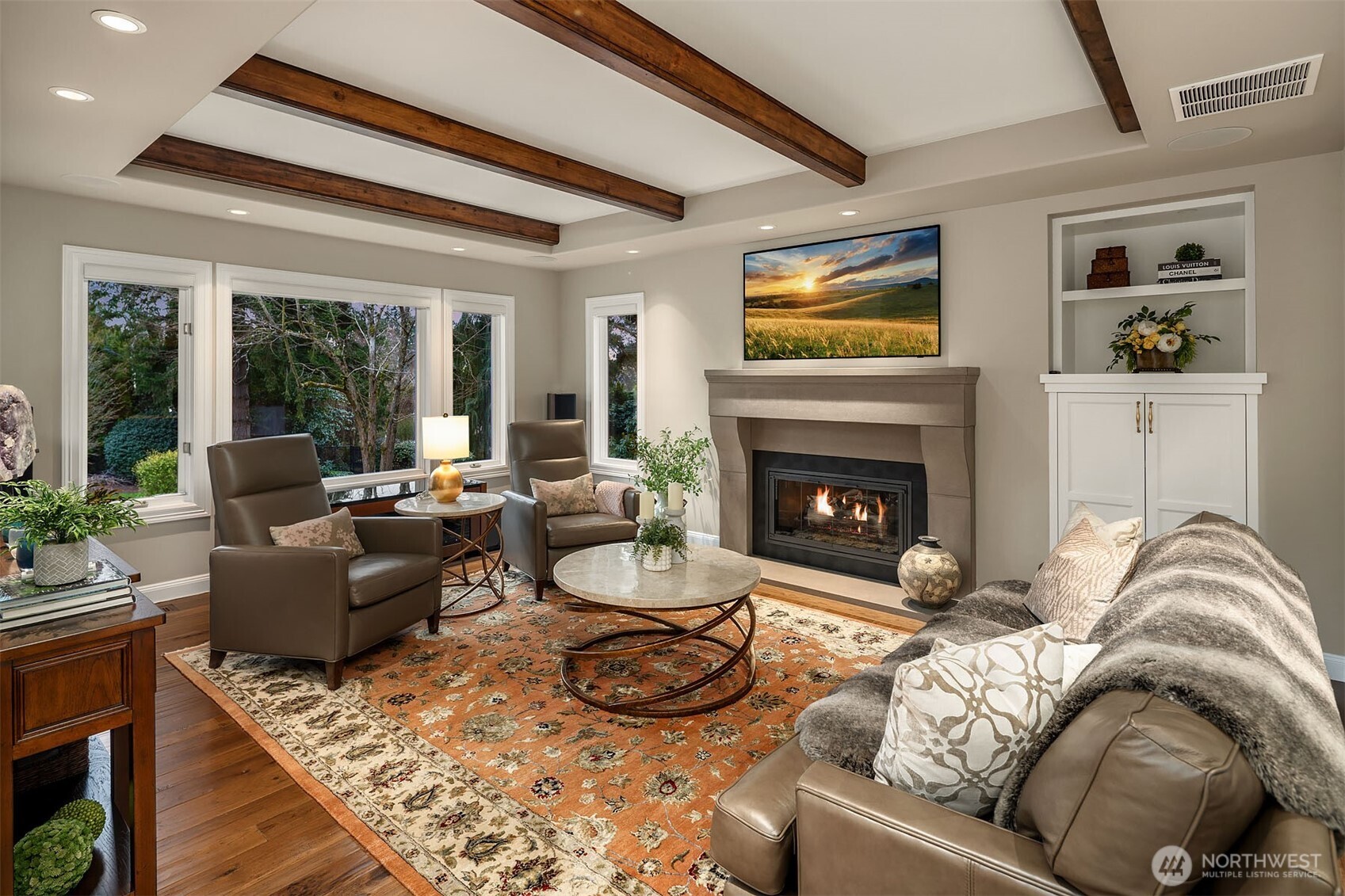 854 Evergreen Point Road Medina, WA 98039 - Photo 11 of 40 a living room with furniture and a fireplace