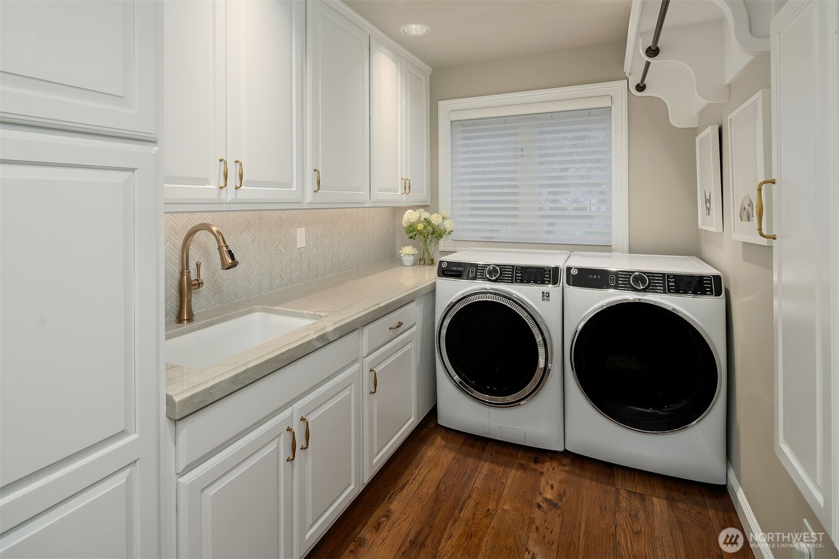 854 Evergreen Point Road Medina, WA 98039 - Photo 17 of 40 a utility room with sink dryer and washer